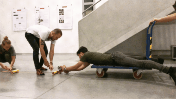 Team installing the Main Event wayfinding line on the floor