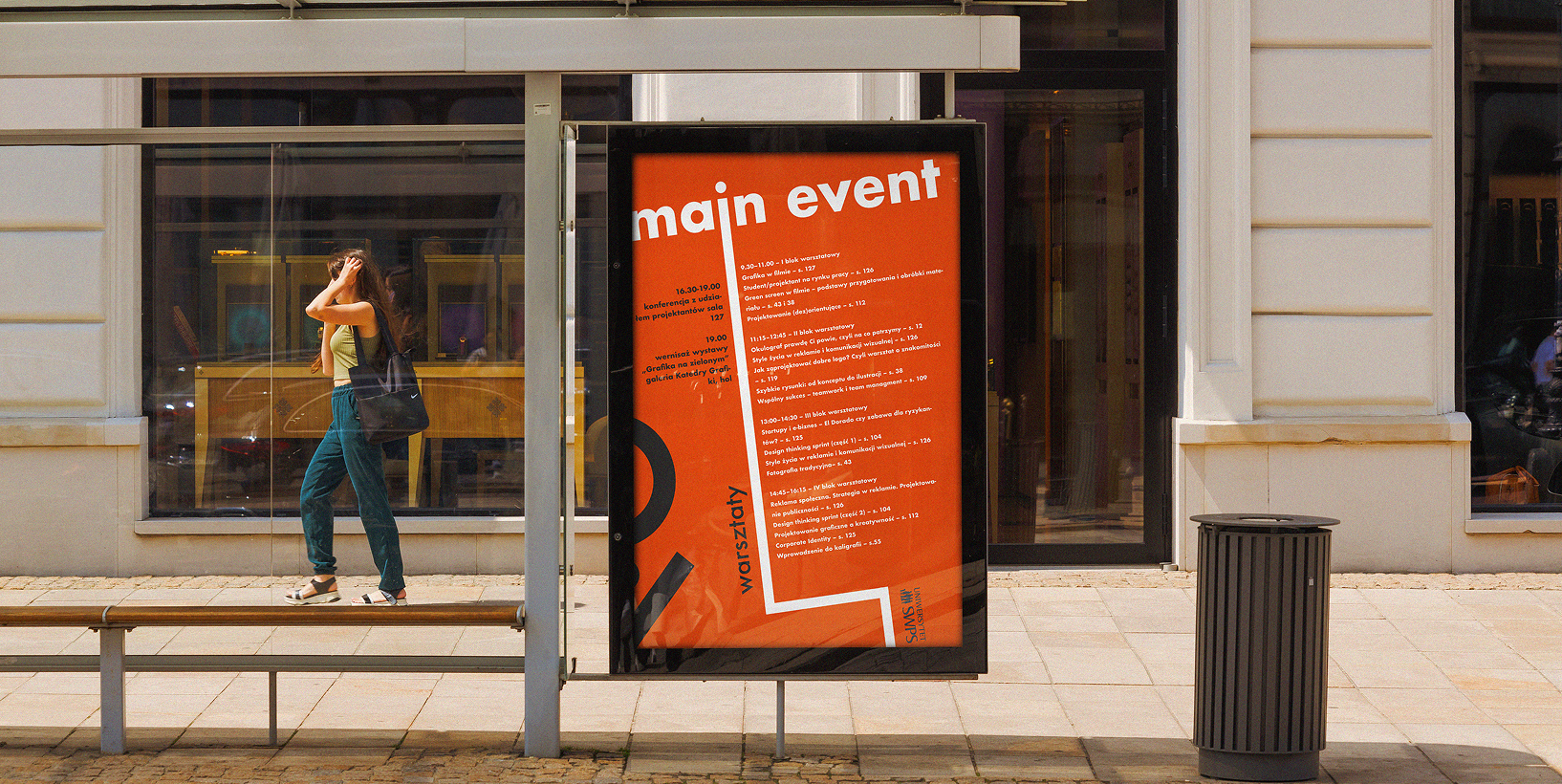 Main Event city poster installed in a street display